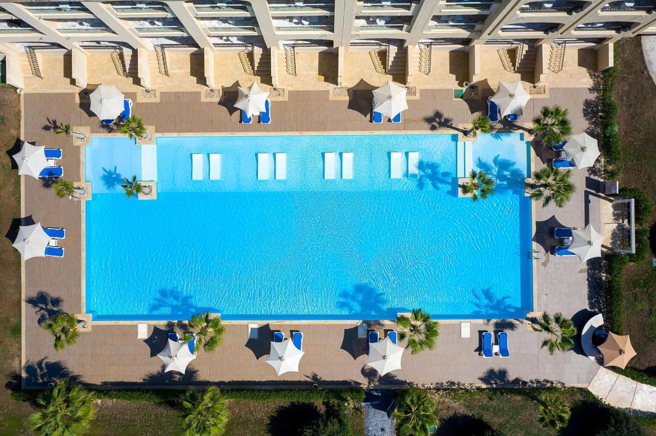 Rixos Alamein - Full Board Plus El Alamein Luaran gambar Aerial view of the pool at the Hilton Mauritius Resort