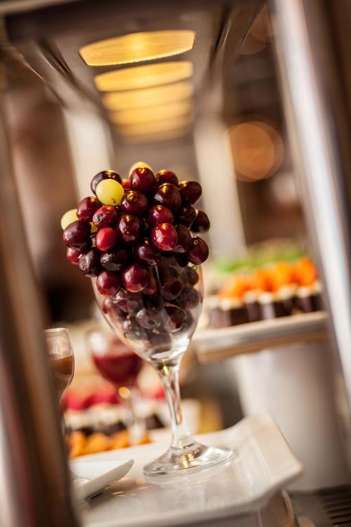 Rixos Alamein - Full Board Plus El Alamein Luaran gambar Grapes in a wine glass
